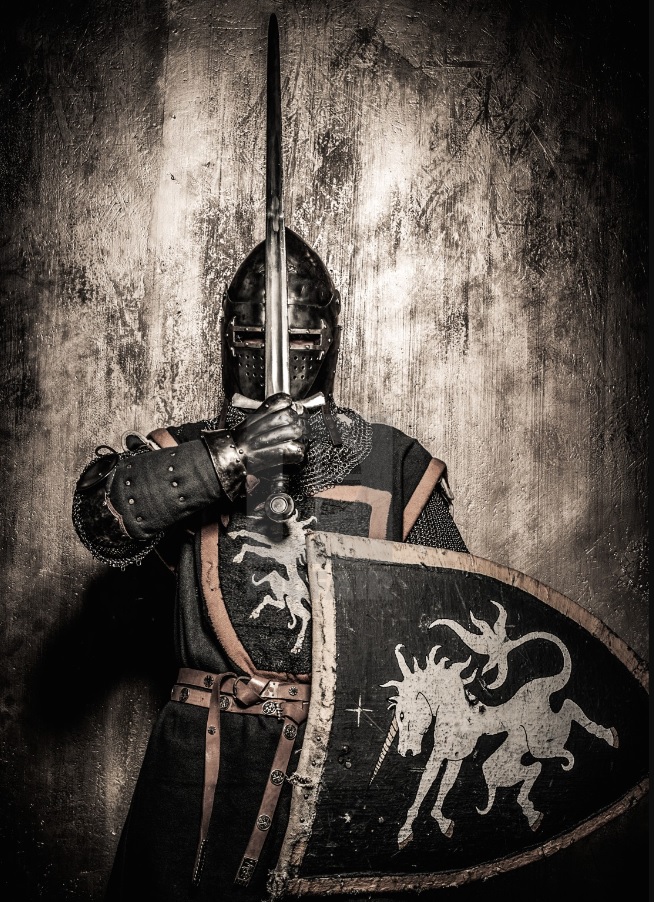 knight in black holding a sword